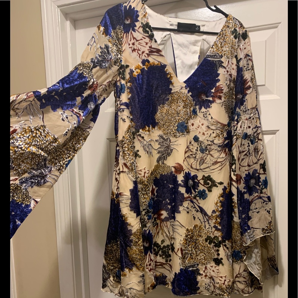 Bell sleeve blouse with back cutout